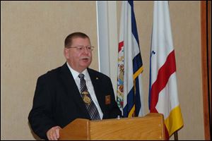 Knights of Pythias official L. Keith Stooksberry, Jr., says members 'take an obligation to pledge honor to God.'