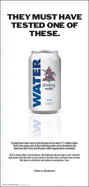 This image provided by Anheuser-Busch InBev., shows a full-page advertisement placed the maker of Budweiser and other beers, that was meant to counter a lawsuit filed in several states that accuses the brewer of cheating consumers out of the stated alcohol percentage by adding water just before bottling its beers. InBev poked fun at the suit by pointing to its charitable donations of drinking water to relief organizations responding to disasters. The ad ran in newspapers across the country.