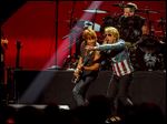  Jon Bon Jovi, right, performs with Richie Sambora at the MGM Grand Arena in Las Vegas. Bon Jovi is going on tour again. This new tour, dubbed Because We Can, after the first single from the new record, will travel the globe through at least July.