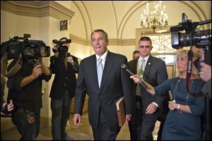 House Speaker John Boehner of Ohio arrives on Capitol Hill in Washington after a meeting at the White House between President Obama and Congressional leaders before billions of dollars in mandatory budget cuts were to start. The Friday meeting  lasting less than an hour  yielded no immediate results.
