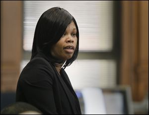Melody Williams makes the opening statement for her defense. Williams, 49, is on trial for the murder of L.C. Lyons, Jr.