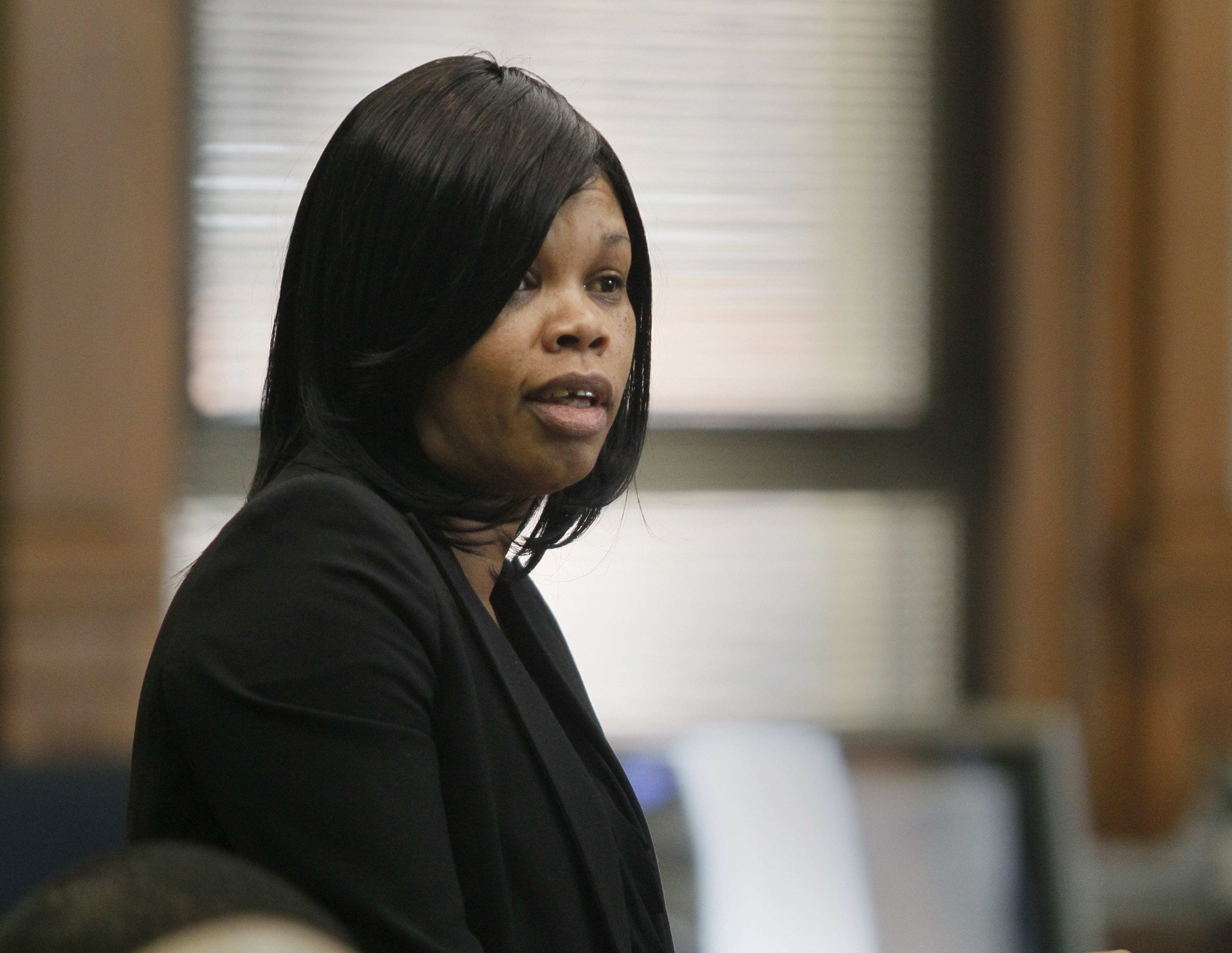 Suspect declares her innocence in slaying The Blade