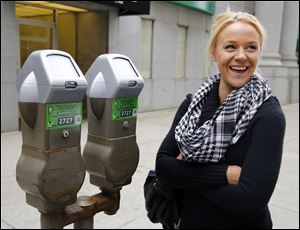 Starr Chellsea Cutino talks about downtown parking meters and a new pay-by-phone application.