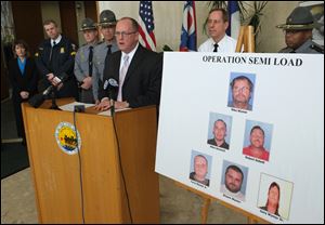 FBI Special Agent Joseph Callahan talks about arrests in a chop shop operation during a news conference at One Government Center February 7, 2013.