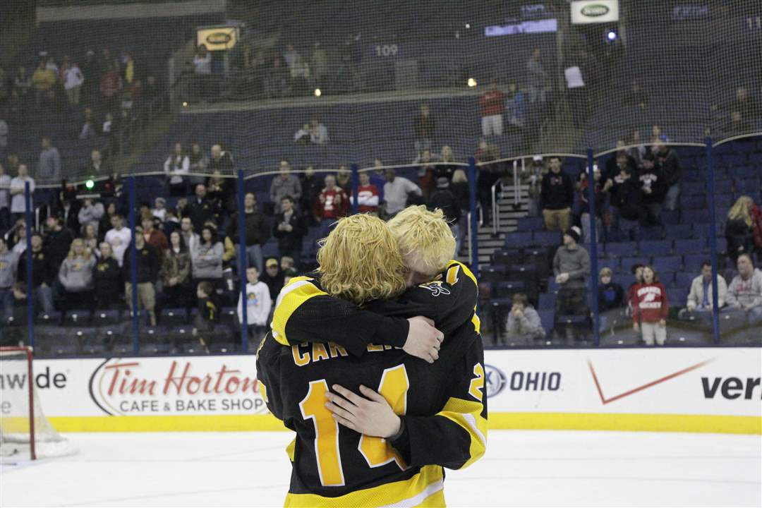 State-hockey-hugs