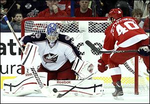 Blue Jackets goalie Sergi Bobrovsky stops a shot by the Red Wings' Henrik Zetterberg in the second period en route to his first shutout. He finished with 29 saves.