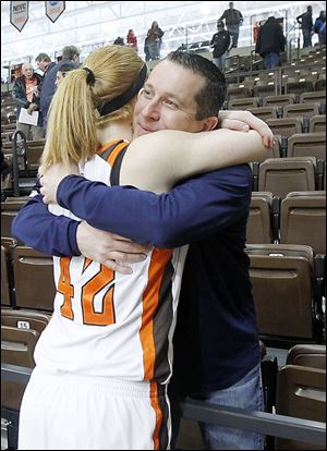 Bowling Green's Danielle Havel hugs former Falcons coach Curt Miller. Miller left BG after last year to take the top job at Indiana.