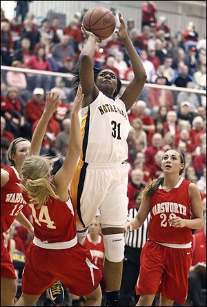 Notre Dame's Tierra Floyd shoots over Wadsworth's Hannah Centea. Floyd led the Eagles (25-3) with 20 points. Notre Dame plays Friday against Kettering Fairmont in the state semifinals at Ohio State’s Schottenstein Center.