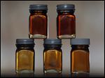 Various grades of maple syrup are displayed. Gov. Rick Snyder has declared March 