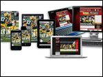  A copy of Sports Illustrated magazine, left, is shown as Sports Illustrated digital subscriptions are displayed on smartphones, tablets, laptops, and a desktop computer. Time Warner Inc. on said that it will spin off the magazine unit behind Time, Sports Illustrated, and People into a separate, publicly traded company by the end of the year.