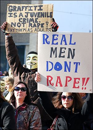 Activists protest outside the courthouse in Steubenville recently over the rape case involving two high school football players who will go on trial on rape charges.