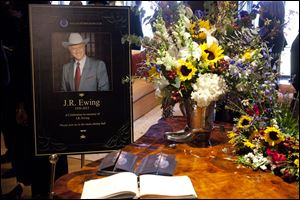 A funeral scene for the character J.R. Ewing, played by Larry Hagman, in an episode of 