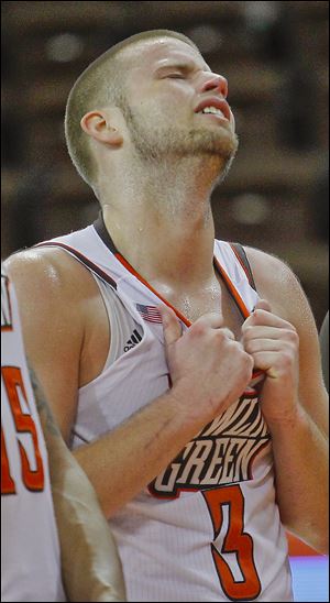 Bowling Green senior Luke Kraus reacts while the band plays after being defeated by Miami.