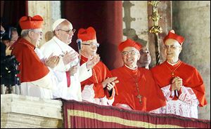 Pope Francis gives his first speech from the balcony of St. Peter's Basilica, asking the crowd, and the world watching, -- to pray for him. U.S. Cardinal Timothy Dolan said he charmed the cardinals as well. 