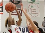  Rogers senior Cha'Ron Sweeney (24) played big all season to help lead Rogers to its best season in school history, posting a 24-4 record and reaching the Division II regional finals.