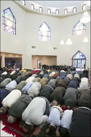 Members of the congregation pray during a Friday prayer service at the Islamic Center of Greater Toledo.