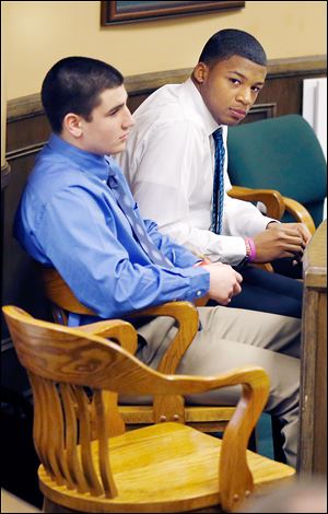 Trent Mays, 17, left, and co-defendant Malik Richmond, 16, sit in court before the start of the third day of their trial on rape charges at the Jefferson County Justice Center in Steubenville, Ohio, on Friday.