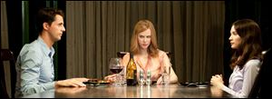  \Matthew Goode, left, Nicole Kidman and Mia Wasikowska, right, in a scene from 