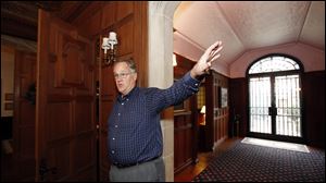 Tony Knight, a great nephew of the builder, says his portion of the Jacobean Revival style mansion has 13,000 square feet.