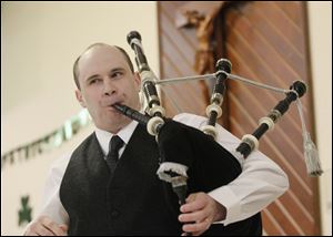 Robert Hosey plays the bagpipes at the Irish festival. The family friendly event offered contemporary and traditional music, as well as dancing and Irish food.