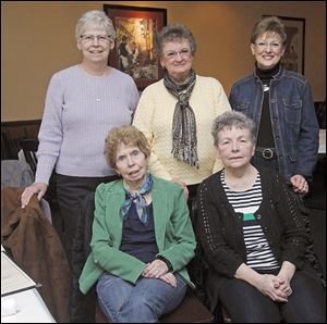 Connie Brack and Jan Peacock, seated from left,  and Gladys Pierson, Barbara Szyperski, and Mona Rathke, standing from left, meet at Eddie Lee’s this month. Gladys Pierson says the reason for their bond is simple:  ‘... we just have a really good time together.’ 