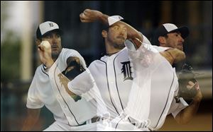 In this multiple exposure photo, Detroit Tigers starting pitcher Justin Verlander throws during the sixth inning of an exhibition spring training baseball game against the Houston Astros in Lakeland, Fla.