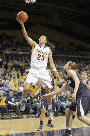 University of Toledo's Inma Zanoguera drives to the hoop for a basket during the first half against Butler's Blair Langlois. She scored 16 points.