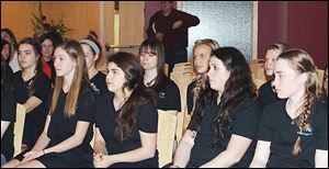 St. Ursula Academy choir members assemble in the school's chapel on Friday where they prayed for a safe trip to New York City and to perform at their best in the competition at Carnegie Hall. The choir was treated to a stellar send-off reserved for competitors representing the all-girls' high school.