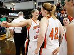  Bowling Green’s Jill Stein, left, and Danielle Havel celebrate after the Falcons defeated Duquesne  in the second round of the WNIT on Saturday. Stein led the Falcons with 16 points in the victory.