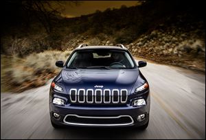 The 2014 Jeep Cherokee Limited is more streamlined, more carlike, more focused on comfort and fuel economy than the previous model.