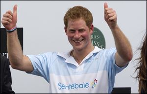 Britain's Prince Harry gives a thumbs up during the award ceremony after playing a charity polo match in Campinas, Brazil, earlier this month.