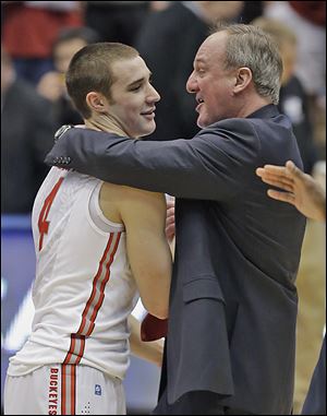 Aaron Craft, a Liberty-Benton graduate, and Ohio State coach Thad Matta celebrate after Craft's shot lifted the Buckeyes past Iowa State and into the NCAA Sweet 16.