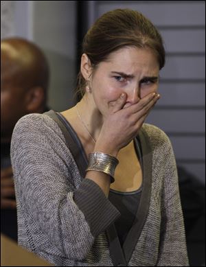 Amanda Knox, shown here in 2011 after returning home from Italy, learned today that Italy's highest criminal court has overturned her acquittal in the slaying of her British roommate and ordered a new trial. 