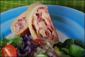 Salami and Cheese Twirls can serve as a delicious appetizer, snack, or hot sandwich.