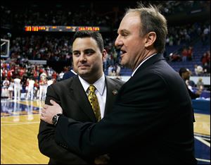 Sean Miller, left, and Ohio State coach Thad Matta meet before a 2007 NCAA tournament game when Miller coached at Xavier. Miller was an assistant for Matta when he coached the Musketeers. The Buckeyes got past Xavier and went onto the NCAA final.