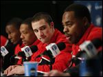  Ohio State's Aaron Craft, center, listens to Deshaun Thomas, right, during a news conference Friday in Los Angeles. Ohio State plays Wichita State in the West Regional finals of the NCAA college basketball tournament tonight.