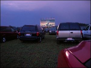 Owners of the Field of Dreams Drive-In in Liberty Center, Ohio, took out loans to invest in digital projection equipment.