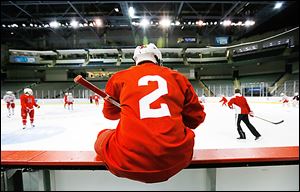 Miami's Taylor Richart sits on the boards during practice at Huntington Center on Friday.