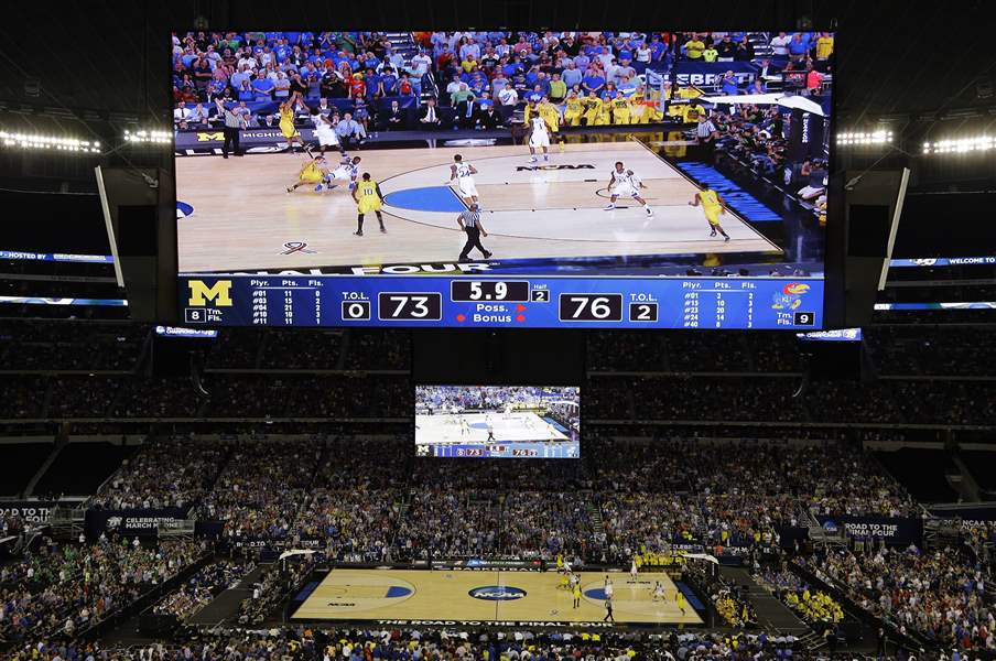 APTOPIX-NCAA-Michigan-Kansas-Basketball-Burke