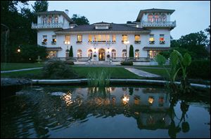 The 1926 24,000 square-foot 'Italian castle' that sits on five acres in Englewood and Englewood Cliffs, N.J., took its current owners two years to renovate the property. The estate includes a pool, gym, home theater, seven-car garage, and a lake home to waterfowl. 