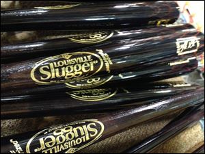 Louisville Slugger is rolling out a new logo for the first time in 33 years on a new bat that company officials say is designed to be the hardest wooden bat ever produced.