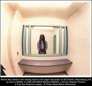 Mumia Abu-Jamal in the visiting room at the super max prison at SCI Greene, Waynesburg, Pa., as seen in the documentary ‘Long Distance Revolutionary: A Journey with Mumia Abu-Jamal’ a film by Stephen Vittoria.  