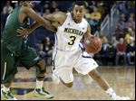  Michigan guard Trey Burke, shown during this regular season game, was selected to the AP All-America team today. 