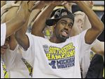  Tim Hardaway, Jr., and his Michigan teammates secured the school’s first trip to the Final Four in 20 years on Sunday.