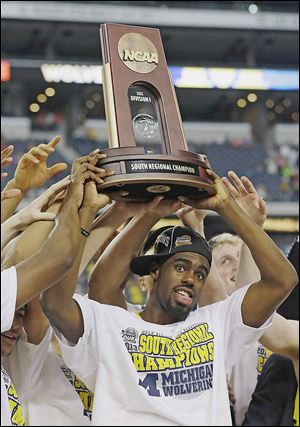 Tim Hardaway, Jr., and his Michigan teammates secured the school’s first trip to the Final Four in 20 years on Sunday.