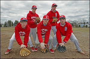 Bowsher looks to defend its City League title with infielders (front, from left) Braiden Greisiger, Mac Jewell, and Joel McGorty, and outfielders (back, from left) Joey Keil and Jacob Empey. The Rebels finished 22-5 last season.