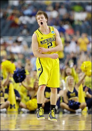 Michigan's Spike Albrecht gave the Wolverines a distinct boost when it seemed the Gators had a chance to climb back into a game in which they trailed by as many as 24 points in the first half.