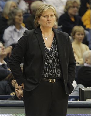 UT head coach Tricia Cullop om the sidelines of a 2012 game.