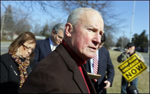 Former Toledo Mayor Carty Finkbeiner speaks during a news conference at Southland Shopping Center, the site of a recent domestic violence shooting which claimed the life of Kaitlin Gerber.