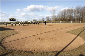 Perrysburg played the inaugural softball game against Saint Francis DeSales, of Columbus, on Perrysburg's new field Tuesday afternoon at Perrysburg High School.